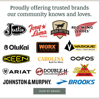 Graphic displaying logos of footwear brands offered by Boots & Soles, with the headline ‘Proudly offering trusted brands our community knows and loves.’ Brands shown include OluKai, Tony Lama, Red Wing Shoes, Thorogood, Brooks, Justin Boots, Irish Setter, Worx by Red Wing Shoes, Vasque, Johnston & Murphy, Ariat, Oofos, Carolina, Keen, and Double-H. A button below reads ‘Shop by Brand.’